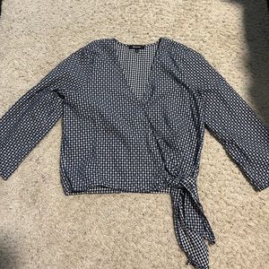 Blue and white v-neck waffle wrap top